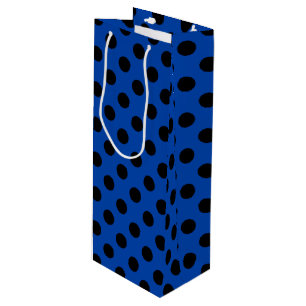 Black polka dots on royal blue wine gift bag