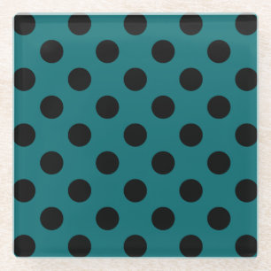 Black polka dots on teal glass coaster