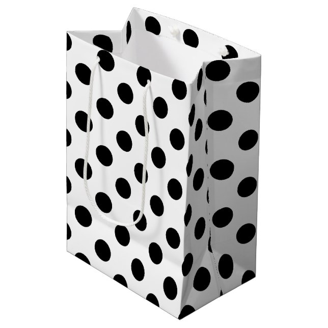 Black polka dots on white medium gift bag (Front Angled)