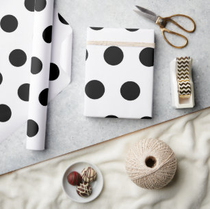 Black polka dots on white wrapping paper