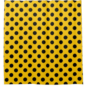 Black polka dots on yellow