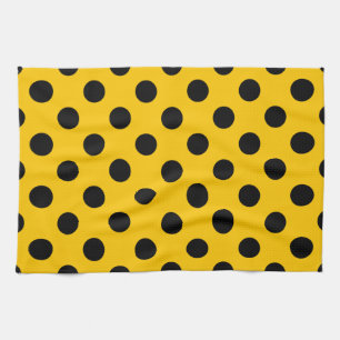 Black polka dots on yellow kitchen towel