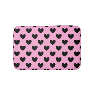 Black polka hearts on cotton candy pink bath mat