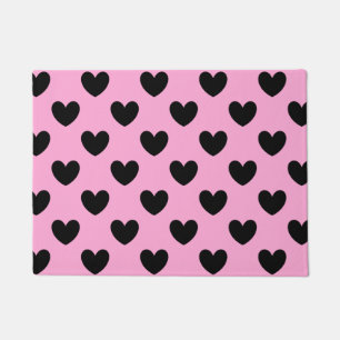 Black polka hearts on cotton candy pink doormat