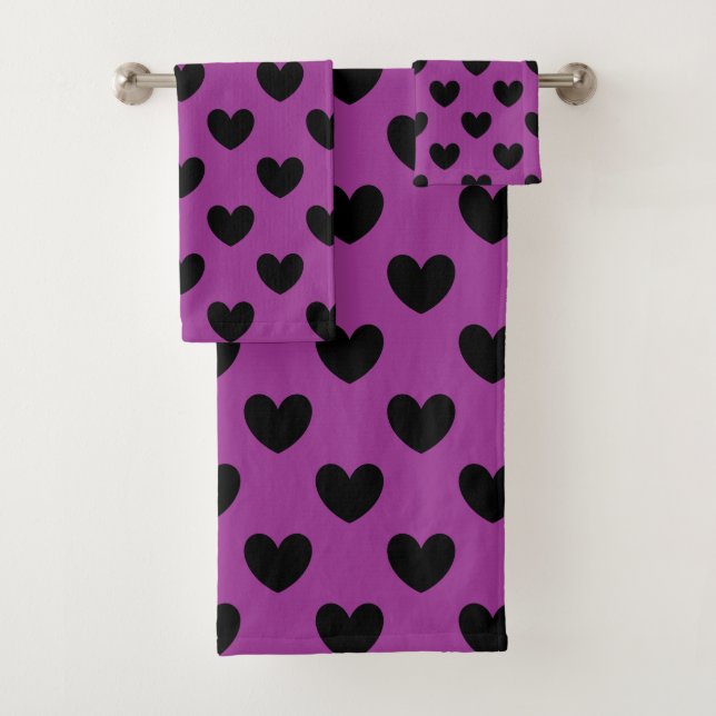 Black polka hearts on purple bath towel set (Insitu)
