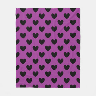 Black polka hearts on purple fleece blanket