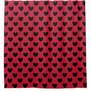 Black polka hearts on red
