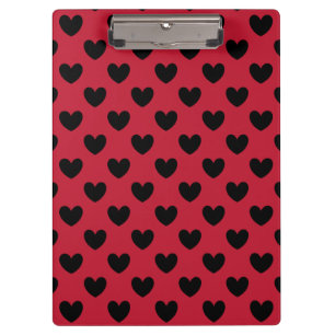 Black polka hearts on red clipboard