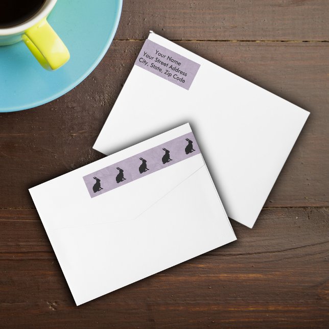 Black Rabbit Silhouette Easter Bunny Wrap Around Label (Row of black silhouette rabbits on marbled purple wrap around return address labels.)