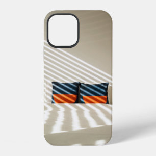 Black red and white plaid textile on white bed iPhone 12 case