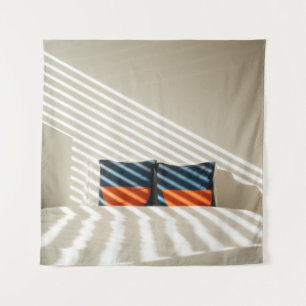 Black red and white plaid textile on white bed tapestry