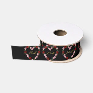 black ribbon with a pink and red heart grosgrain ribbon