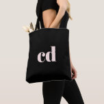 Black rose gold monogram initials elegant modern tote bag<br><div class="desc">A classic chic black background. Personalize and add your monogram initials written with girly and feminine rose gold coloured block letters. Modern,  trendy and simple.</div>