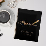 Black rose gold school work study typography 2025 planner<br><div class="desc">A chic black background,  decorated with a feather pen.  Personalize and add a name and year.  Golden text: Planner</div>