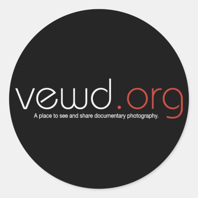 Black round sticker (Front)