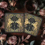 Black Royal Lion Medieval Sword Wedding Square Paper Coaster<br><div class="desc">Add royal charm to your tablescape! These custom wedding coasters feature a majestic lion and floral design with your names and monogram, all in luxurious gold against a black background. Perfect for a medieval fantasy celebration with timeless elegance! The gold featured on this item is NOT real foil and is...</div>