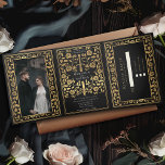 Black Royal Medieval Sword Wedding Tri-Fold Invitation<br><div class="desc">Announce your wedding in style with this medieval fantasy tri-fold invitation! This invite features a majestic gold sword and florals, with a special photo of the couple against a black background—the perfect mix of romance and adventure. NOTE: This design does NOT feature real foil. The placeholder image was provided by...</div>