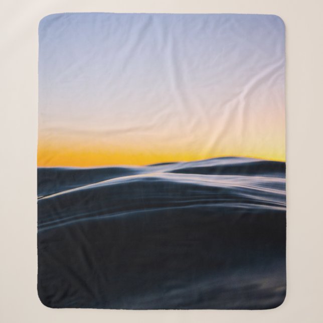 BLACK SAND UNDER ORANGE SKY DURING SUNSET SHERPA BLANKET (Front)