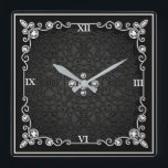 Black & Silver Art Deco Wall Clock<br><div class="desc">This clock is made to look as if it came from the art deco period - with a lot of metallic and gemstones for the richness. This clock makes great gifts for people buying a new home or re-decorating the home they're in. You can find this clock at Home Comfort...</div>