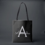 Black Silver Modern Script Girly Monogram Name Tote Bag<br><div class="desc">Black and Silver Elegant Add Your Own Name Monogram Book Bag. This Book Bag can be customized to include your initial and first name and given as a gift for Christmas,  Sweet 16 Birthday,  Bridal Shower or a Wedding.</div>