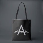 Black Silver Modern Script Girly Monogram Name Tote Bag<br><div class="desc">Black and Silver Elegant Add Your Own Name Monogram Book Bag. This Book Bag can be customized to include your initial and first name and given as a gift for Christmas,  Sweet 16 Birthday,  Bridal Shower or a Wedding.</div>