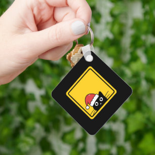 Black Sneaky Santa Cat U.S. Warning Sign Keychain