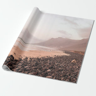 BLACK STONES ON SEASHORE WRAPPING PAPER
