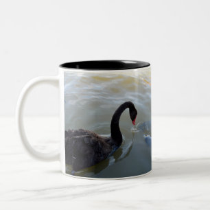 Black Swan Being Attacked By Giant Fish, Two-Tone Coffee Mug