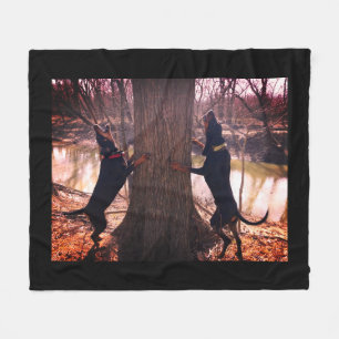 Black & Tan Coonhounds Treeing On The River Fleece Blanket