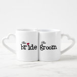 Black Text Bride and Groom Lovers Mugs<br><div class="desc">Black Text Bride and Groom lovers mugs that fit together perfectly, just like you do! This bride and groom design features black text and a small red heart for the bride. This adorable lovers mug set is a great gift for the newlyweds or also makes a great couple's shower gift!...</div>