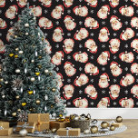 Black Vintage Santa Claus Christmas Wallpaper<br><div class="desc">Bring the magic of the holidays into your home with this black vintage Santa Claus Christmas wallpaper. Featuring charming illustrations of Santa's cheerful face and delicate snowflakes against a black background, this design adds a festive and nostalgic touch to any room. Perfect for creating a cozy and merry atmosphere, this...</div>