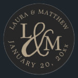 Black Wedding Monogram Classic Round Sticker<br><div class="desc">wedding  feature your initials worked into a monogram design,  joined by a decorative script ampersand. Your names and wedding date appear in white lettering,  curved around the outside.</div>