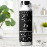 Black White Business Logo Water Bottle<br><div class="desc">Fun and trendy way to preset your business, brand, or custom design with this messy dot or dalmatian dot pattern accent. Personalize this water bottle with your business or brand logo, or even a design of yours that you want to feature. Change out the background and font colours and typography...</div>