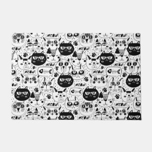 Black white cats faces pattern doormat