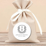 Black White Crest Modern Monogram Wedding  Classic Round Sticker<br><div class="desc">Add a touch of timeless elegance to your wedding with these Black White Crest Modern Monogram Wedding Classic Round Stickers. Featuring a crisp black and white design, a refined crest emblem, and a personalized monogram, these stickers are perfect for sealing envelopes, decorating favours, or enhancing your wedding stationery. Their minimalist...</div>