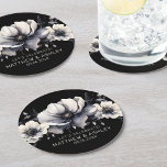 Black White Elegant Floral Wedding Round Paper Coaster<br><div class="desc">Cute and simple black and white flower wedding design. A classic but whimsical look with black, grey and cream coloured flowers with black fonts and modern lettering. Edit all of the text to your own information. Great for a boho wedding with a modern twist, a winter or spring classic affair,...</div>