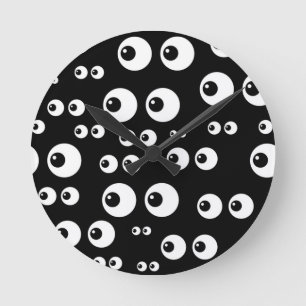 black white eyes round clock