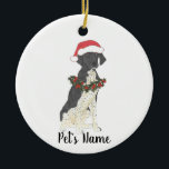 Black & White German Shorthaired Pointer Christmas Ceramic Ornament<br><div class="desc">Make the nice list this year with a personalized Christmas ornament of your sweet black and white german shorthaired pointer elf in a santa hat and red and green holly wreath! For the sweetest gifts,  pair it with a matching art print or another item from my collection!</div>