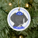 Black & White German Shorthaired Pointer Hanukkah Ceramic Ornament<br><div class="desc">Celebrate your favourite mensch on a bench with personalized ornament! This design features a sweet illustration of a black and white german shorthaired pointer dog with a blue and white yarmulke. For the most thoughtful gifts, pair it with another item from my collection! To see more work and learn about...</div>