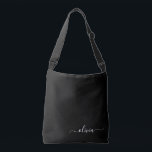 Black White Modern Minimalist Elegant Monogram Crossbody Bag<br><div class="desc">Introducing our Black and White Minimalist Modern Monogram Collection: Embrace simplicity and sophistication with our minimalist designs, curated to elevate your style effortlessly. Crafted with a keen eye for modern aesthetics, this collection features sleek black and white designs accentuated by personalized monograms. From chic stationery to versatile accessories, our collection...</div>