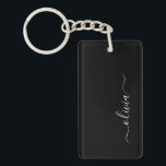 Black White Modern Minimalist Elegant Monogram Keychain<br><div class="desc">Introducing our Black and White Minimalist Modern Monogram Collection: Embrace simplicity and sophistication with our minimalist designs, curated to elevate your style effortlessly. Crafted with a keen eye for modern aesthetics, this collection features sleek black and white designs accentuated by personalized monograms. From chic stationery to versatile accessories, our collection...</div>