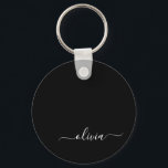 Black White Modern Minimalist Elegant Monogram Keychain<br><div class="desc">Introducing our Black and White Minimalist Modern Monogram Collection: Embrace simplicity and sophistication with our minimalist designs, curated to elevate your style effortlessly. Crafted with a keen eye for modern aesthetics, this collection features sleek black and white designs accentuated by personalized monograms. From chic stationery to versatile accessories, our collection...</div>