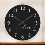 Black White Modern Minimalist Elegant Monogram Large Clock<br><div class="desc">Introducing our Black and White Minimalist Modern Monogram Collection: Embrace simplicity and sophistication with our minimalist designs, curated to elevate your style effortlessly. Crafted with a keen eye for modern aesthetics, this collection features sleek black and white designs accentuated by personalized monograms. From chic stationery to versatile accessories, our collection...</div>