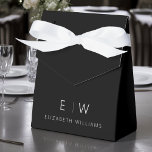 Black White Modern Minimalist Monogram Name Favor Box<br><div class="desc">Elevate your event's favours with our Classic Elegant Modern Minimalist Monogram Favour Box. Meticulously designed, these favour boxes seamlessly blend timeless sophistication with contemporary minimalism, making them a stylish and memorable addition to your celebration. Crafted with precision and attention to detail, these favour boxes are more than just containers; they...</div>