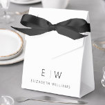 Black White Modern Minimalist Monogram Name Favor Box<br><div class="desc">Elevate your event's favours with our Classic Elegant Modern Minimalist Monogram Favour Box. Meticulously designed, these favour boxes seamlessly blend timeless sophistication with contemporary minimalism, making them a stylish and memorable addition to your celebration. Crafted with precision and attention to detail, these favour boxes are more than just containers; they...</div>