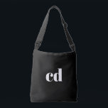 Black white monogram initials modern crossbody bag<br><div class="desc">A classic chic black background. Personalize and add your monogram initials written with white block letters. Modern,  trendy and simple.</div>