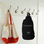 Black white monogram initials name sling bag<br><div class="desc">Black background,  white text. Personalize and add your monogram initials and full name.</div>