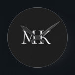 Black White Monogram  Round Clock<br><div class="desc">Modern Black White Monogram Suitcases. Beautiful design featuring white double initial monogram text on black. Personalize with your own text. Would make an excellent gift for birthdays,  holidays,  graduations,  promotions,  any special occasion,  or everyday.</div>