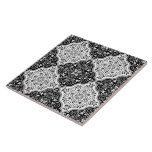 Black & White Moroccan Themed Tile Pattern<br><div class="desc">This seamless ceramic tile features black and white Moroccan motive tile.</div>