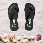 Black White Name Bride Bridal Party Bachelorette Flip Flops<br><div class="desc">A simple black and white minimalist typography design for a bridal shower, bachelorette party or beach wedding. The text is customizable and can be personalized with your own name and bride slogan. For example, Bride Squad instead of Team Bride, Bride repeated on the left and right foot, or something else....</div>